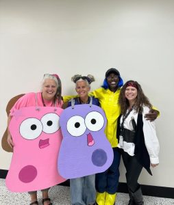 Science Teachers Mrs. Mazoff, Mrs. Graves, Mrs. Keller, and senior Jay all dressed up for character day. 